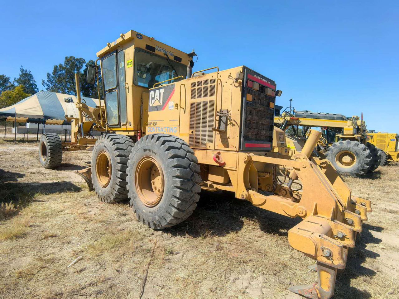 CAT motor grader at equipment display