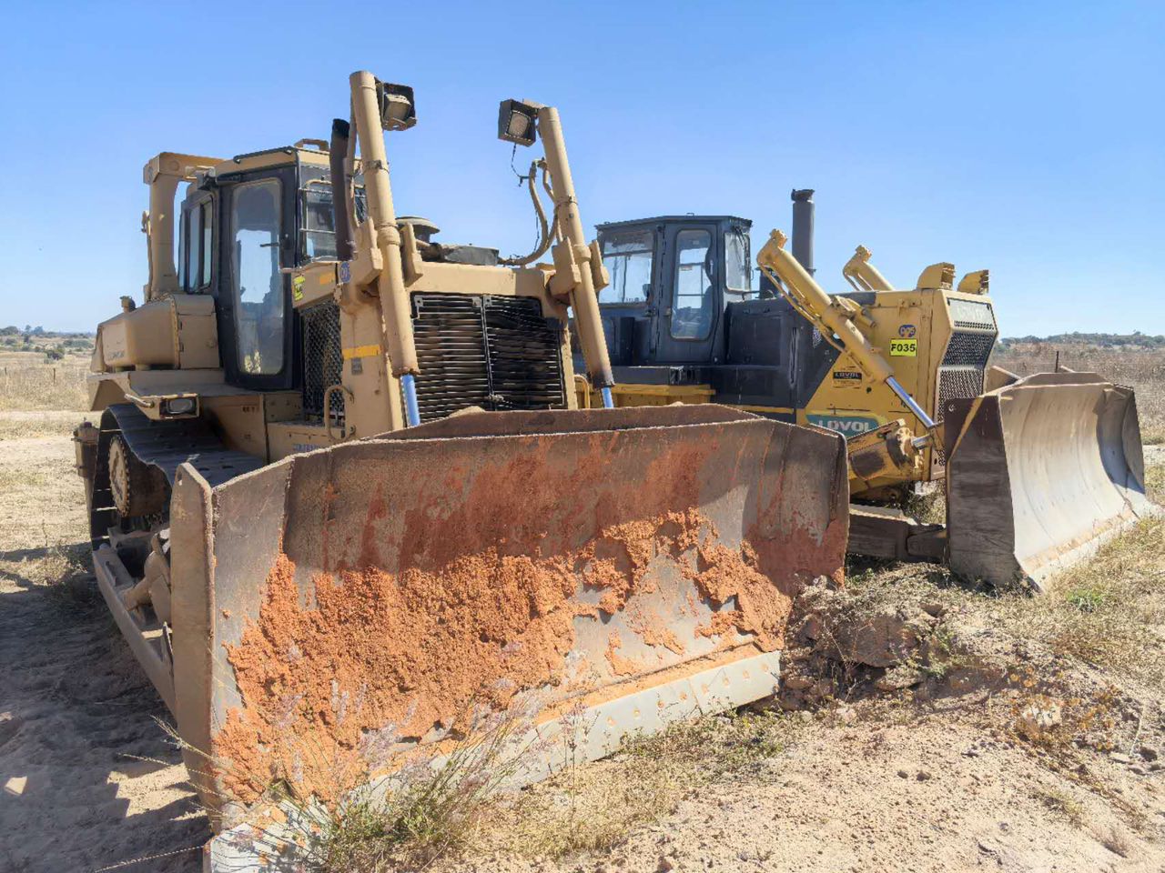 Heavy bulldozers at construction site